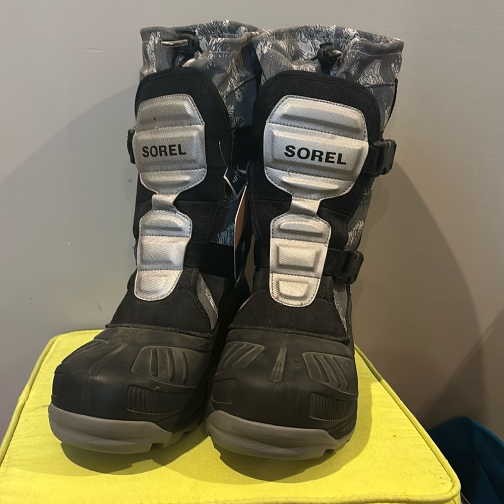 Waterproof boots, never used, size 14 men’s.